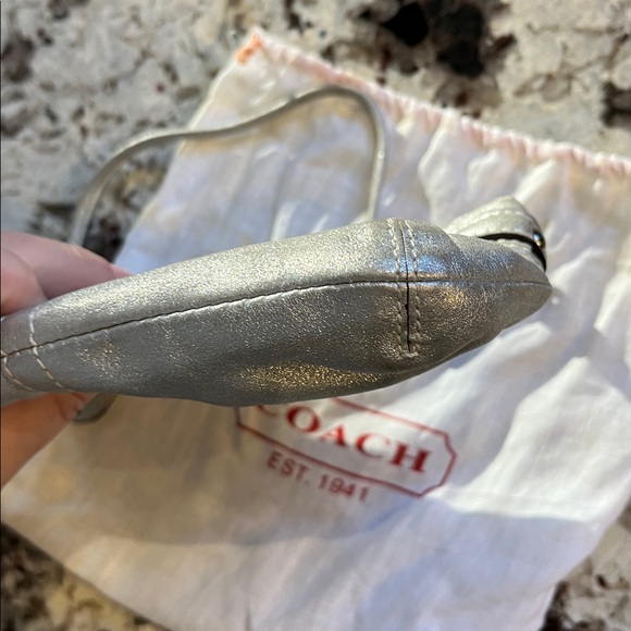 Coach Silver leather wristlet. Pre-Owned Condition-Very Good. - Picture 8 of 9